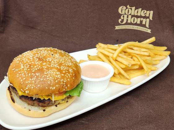 A burger with fries