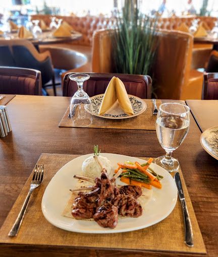Lamb chops served at a set table